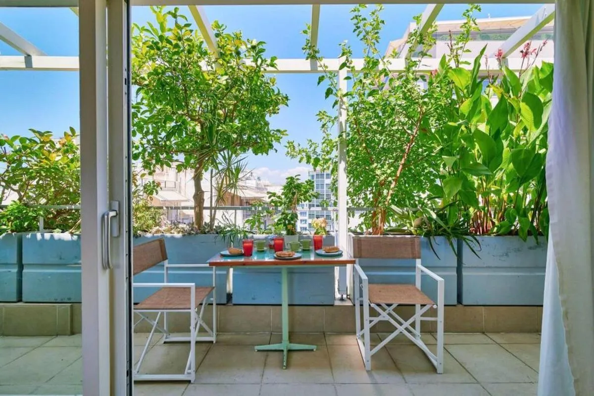 Image 6 of 360 view in roof top appartment with patio