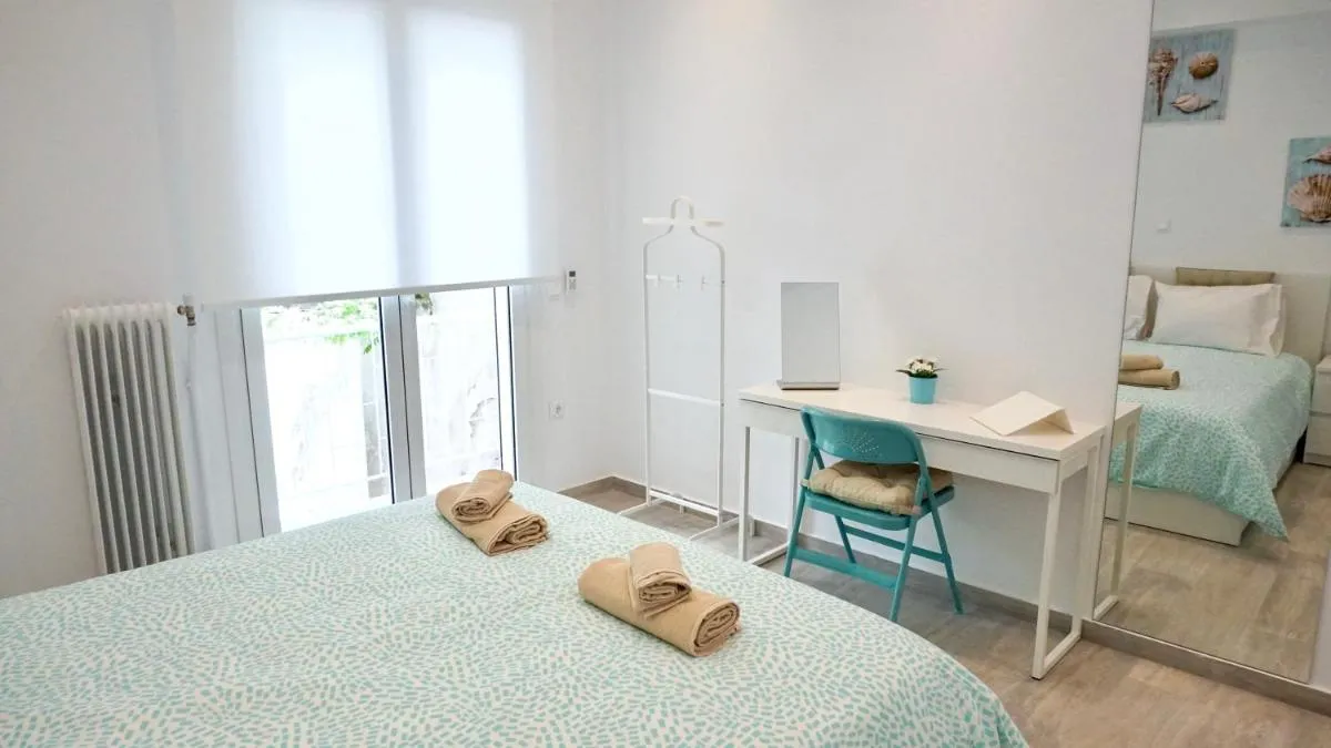 Image 2 of Minimal Fresh Design Apt in Athens