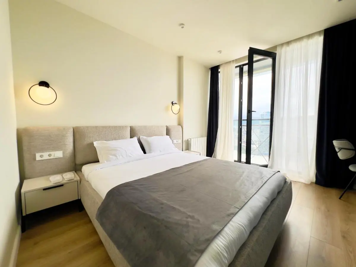Image 1 of Солнечная квартира с отдельной спальней и панорамным видом на горы Next Apartments