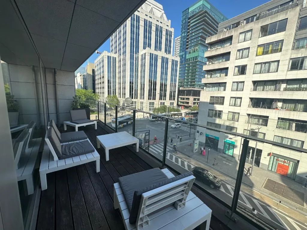 Image of 3 Bedroom Apartment in City Center with Balcony View