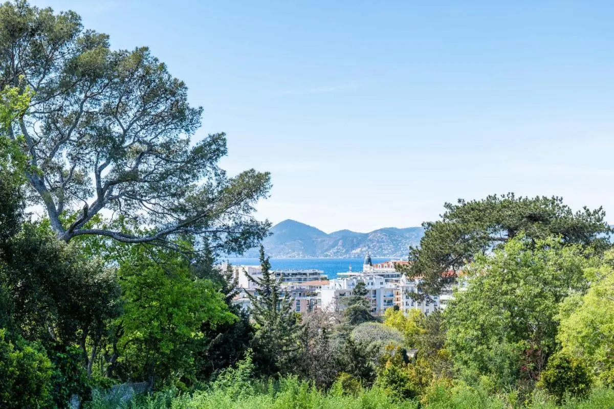 Image 4 of Garden-Level Apartment Pool & Sea View