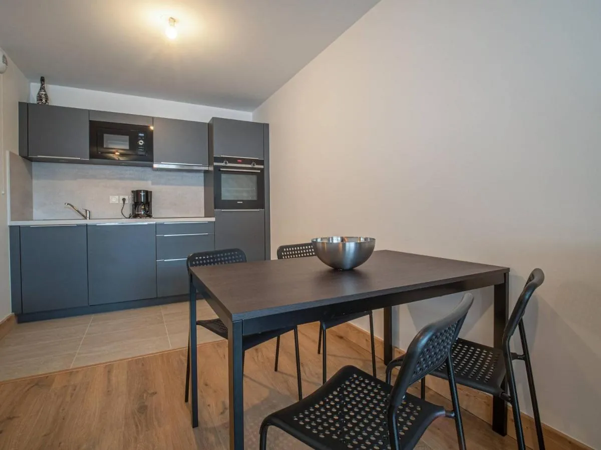 Image 4 of Appartement cosy 2 ch, 7 pers, pied de pistes, parking, wifi – FR-1-356-505