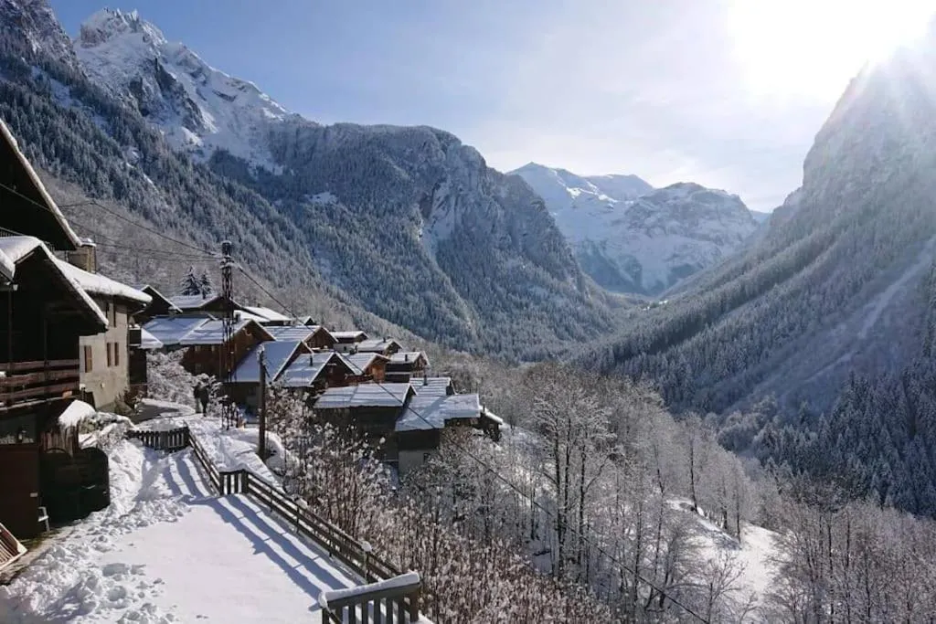 Image of Mountain house with two barns and a garden