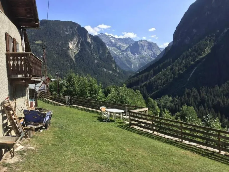 Image 2 of Mountain house with two barns and a garden