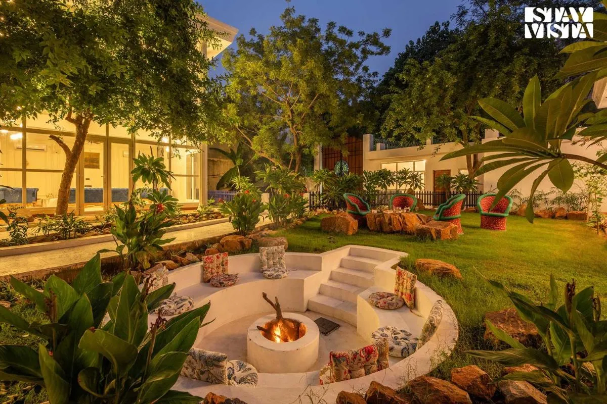 Image 4 of StayVista’s Indraj Manor – Roman-Inspired Villa with Posh Interiors, Mesmerizing Garden & Outdoor Fireplace