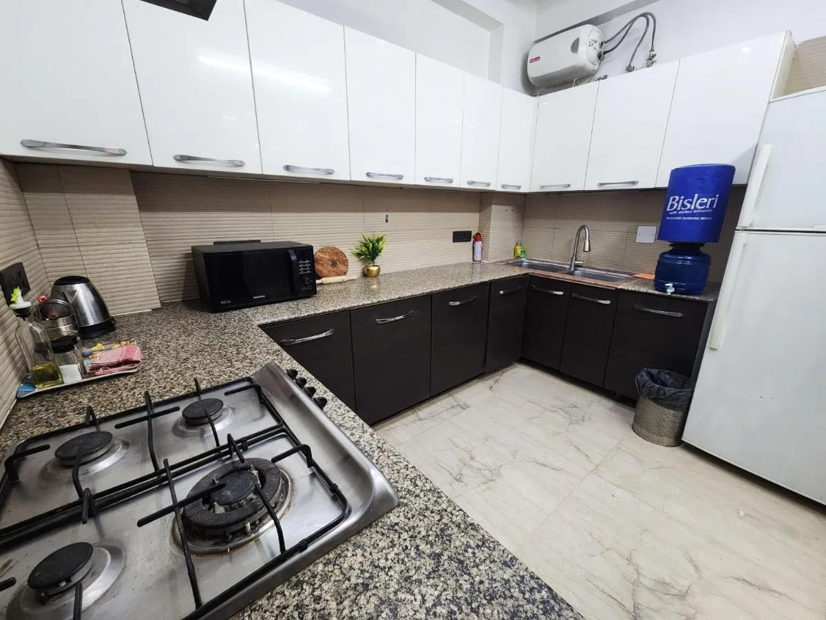 Image 3 of Sunlit Premium 1BHK Suite with big kitchen 9