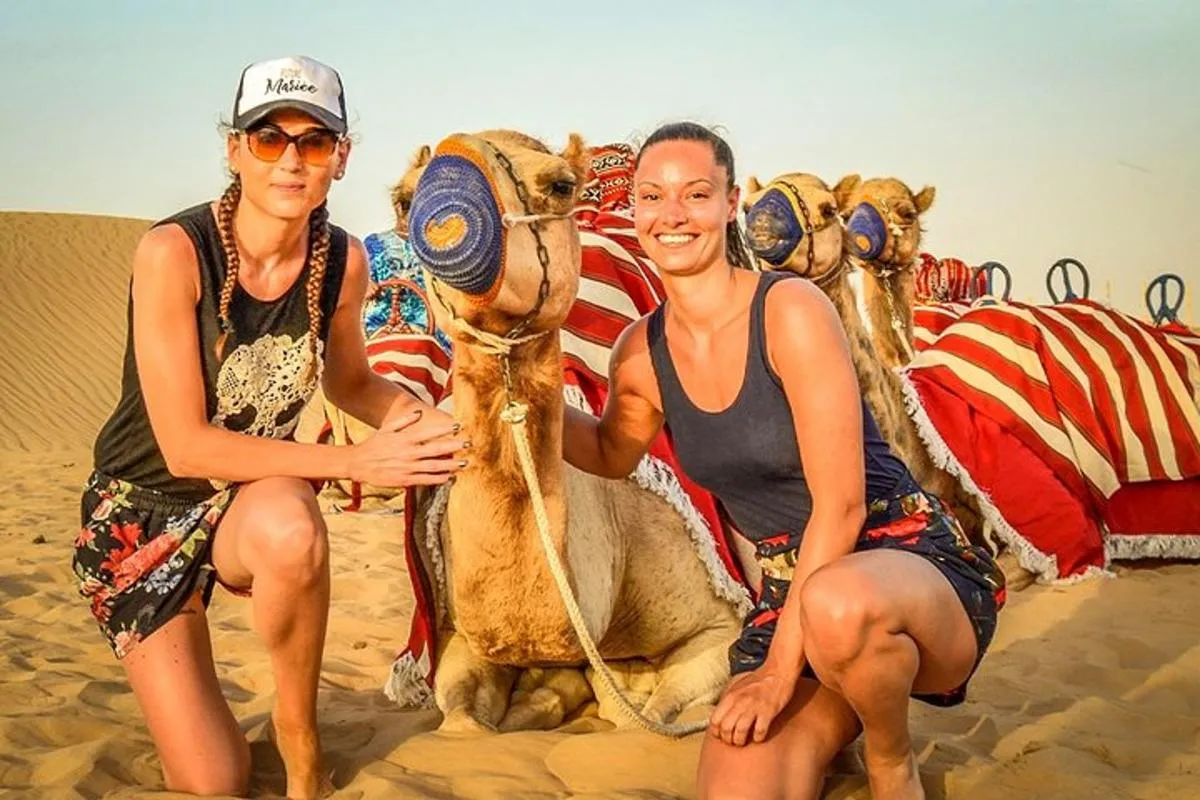 Image 2 of Abu Dhabi: Desert Safari with BBQ, Camel Ride & Sandboarding