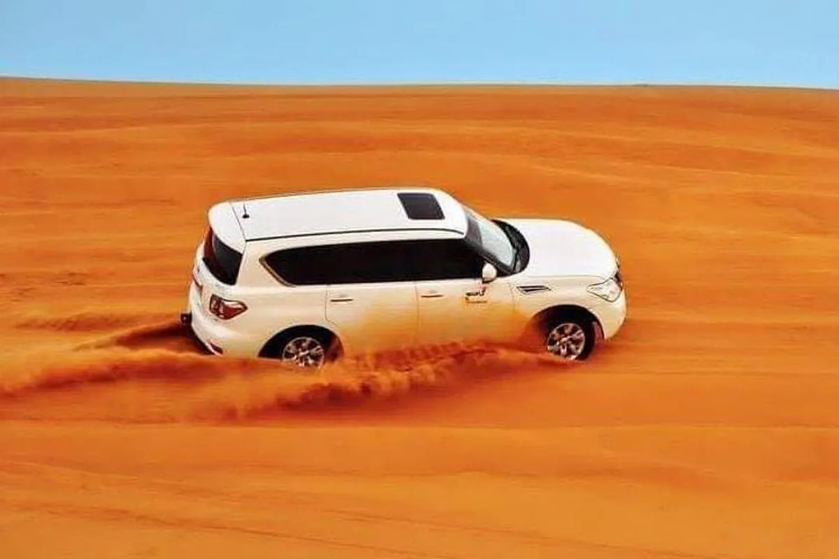 Image 0 of Dubai Desert Afternoon Safari with Camel Ride, BBQ Dinner, and Belly Dancing