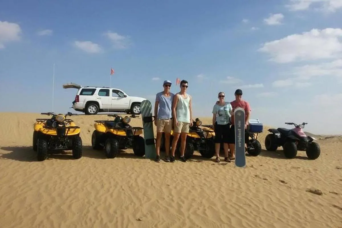Image 2 of Dubai Desert Morning Tour in 4WD Vehicle: Camel Ride, Quad Bike Tour, Sandboarding, and Camel Farm