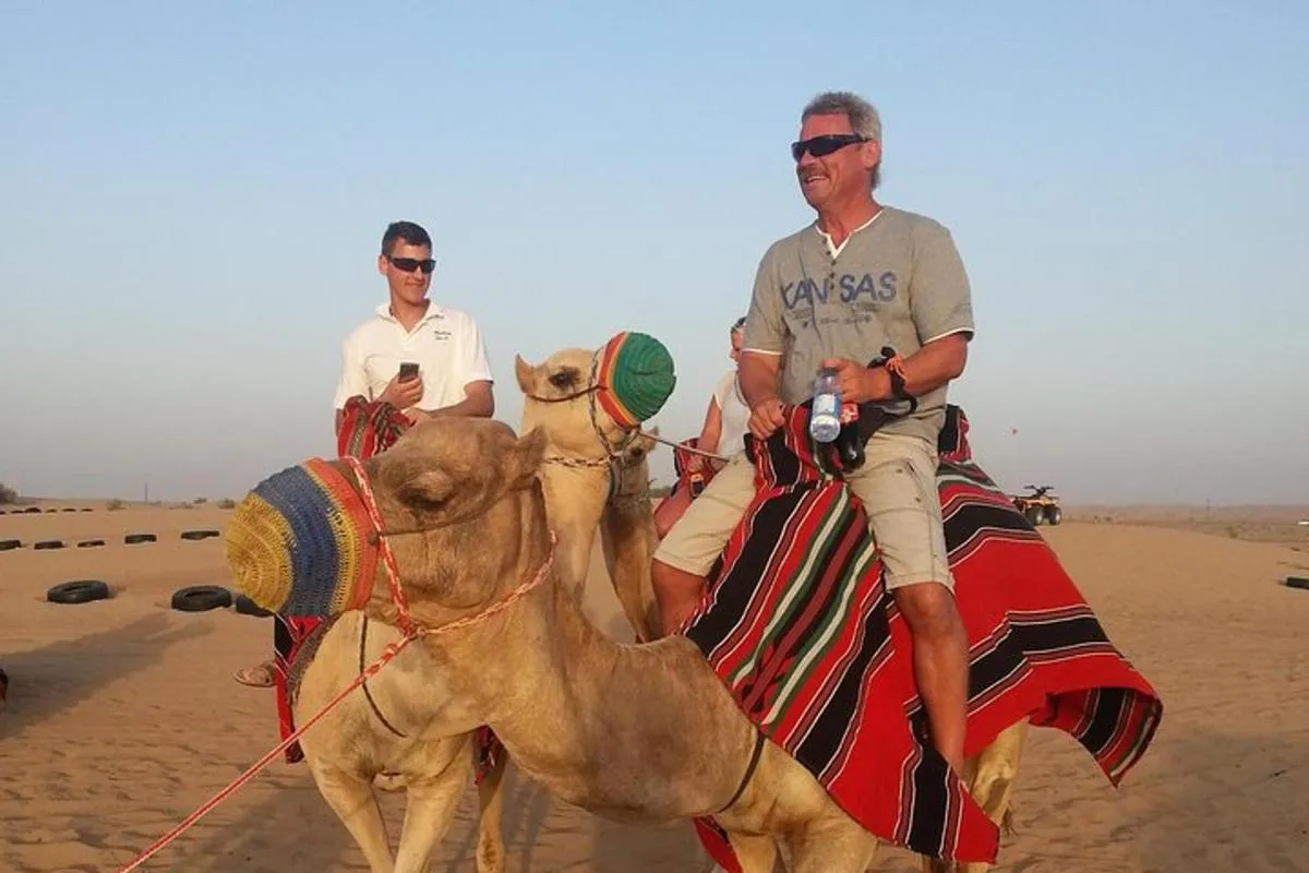Image 4 of Dubai Desert Morning Tour in 4WD Vehicle: Camel Ride, Quad Bike Tour, Sandboarding, and Camel Farm