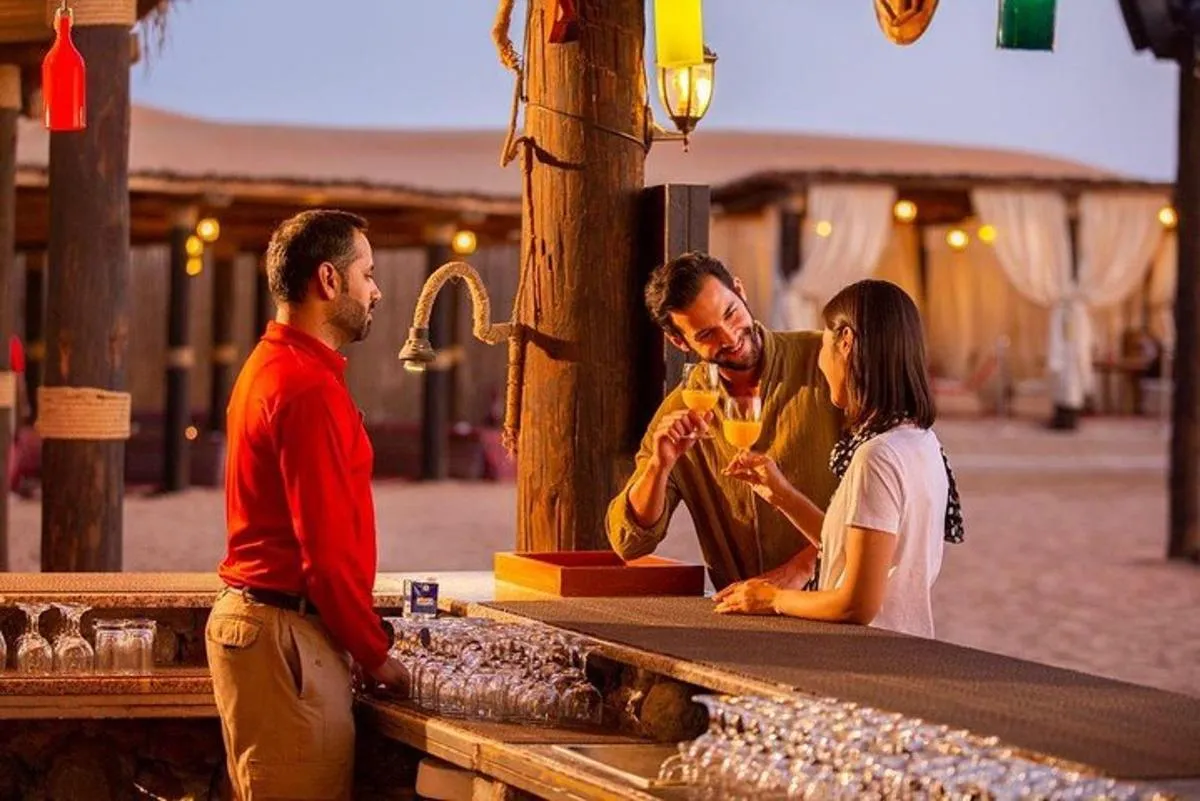 Image 1 of Dubai Desert Safari: Camel Ride, Sandboarding, BBQ & Soft Drinks