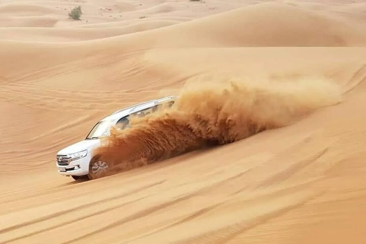 Image 0 of Dubai Desert Safari Tour Hotel Transfer, Camel Ride & BBQ Dinner