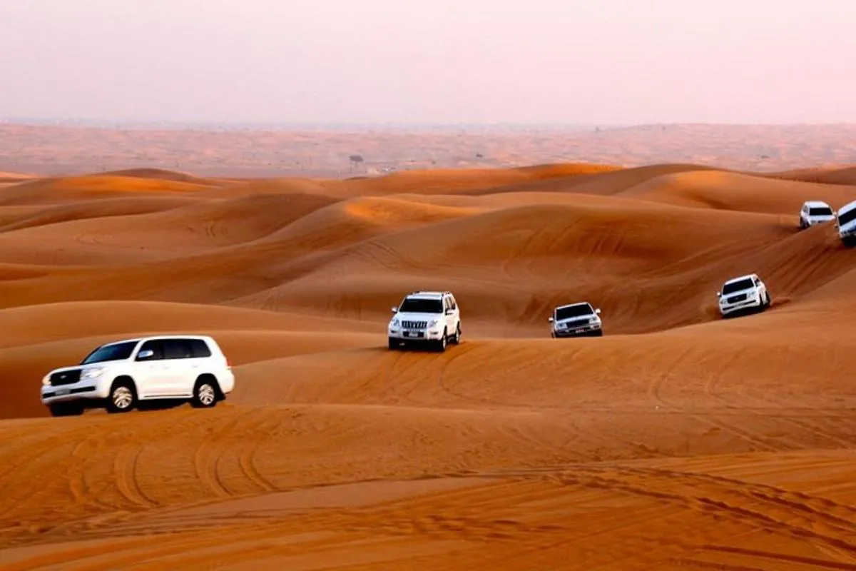 Image 1 of Dubai Desert Safari with BBQ Dinner, Sandboarding, Camels & Shows