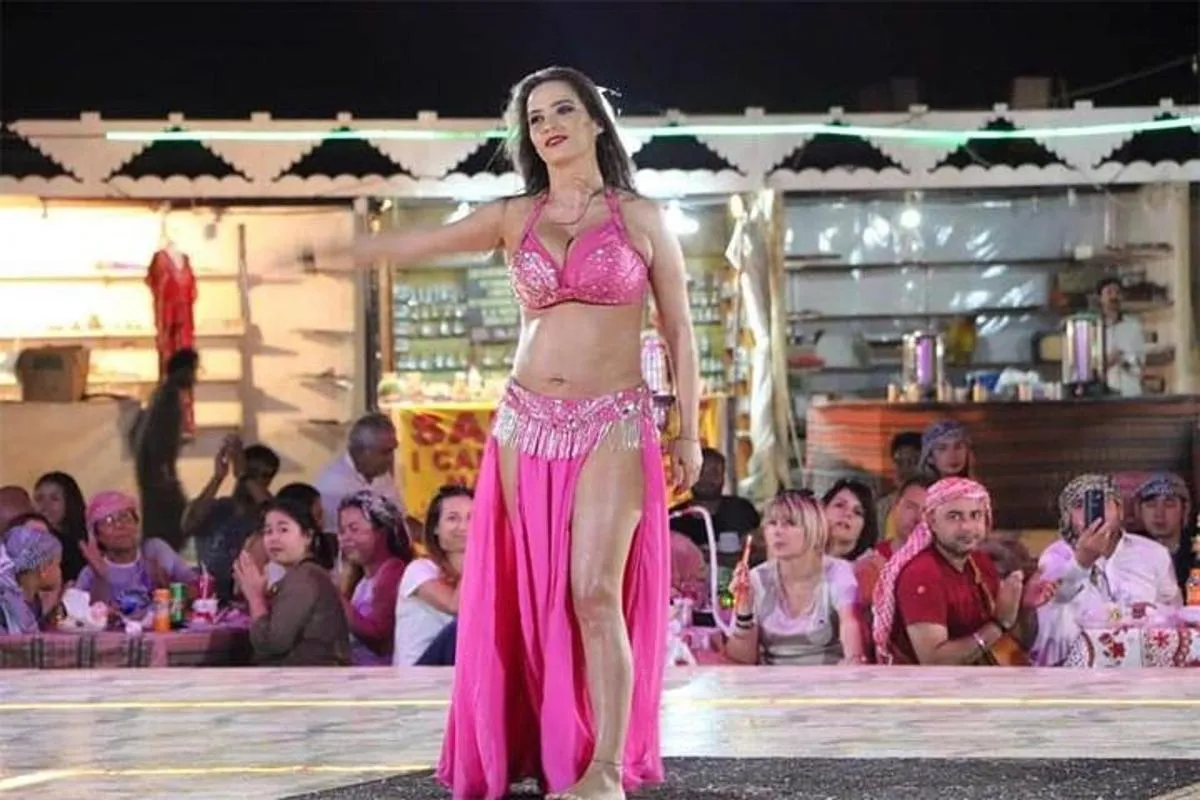 Image 3 of Dubai Desert Safari with Dance show, Sand Boarding, Camel & BBQ