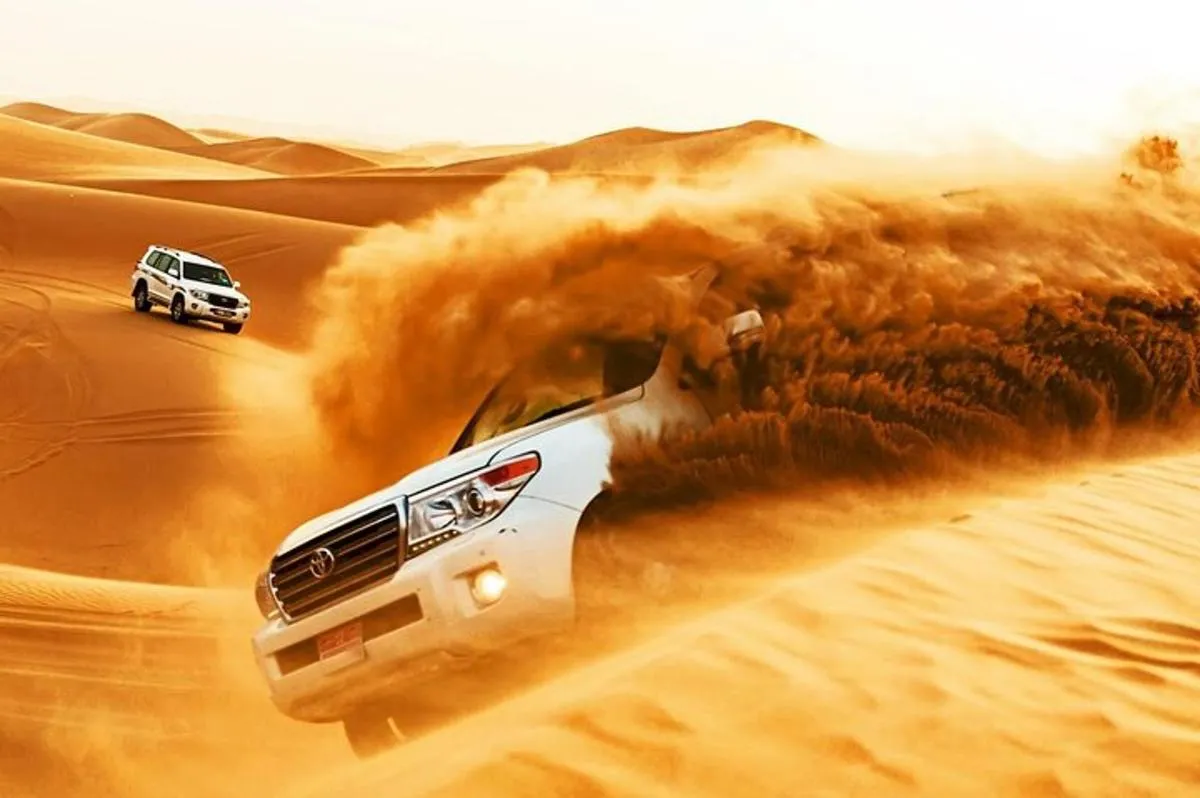 Image 0 of Dubai Desert Safari with Dune Bashing, Camel rides & BBQ Dinner