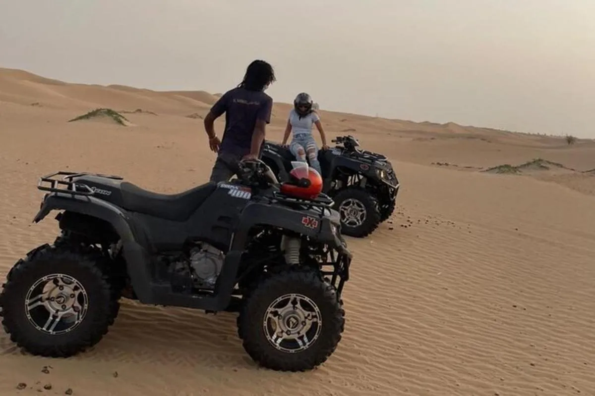 Image 0 of Dubai Desert Safari with Quad Bike, Camel Ride, Dinner and Shows