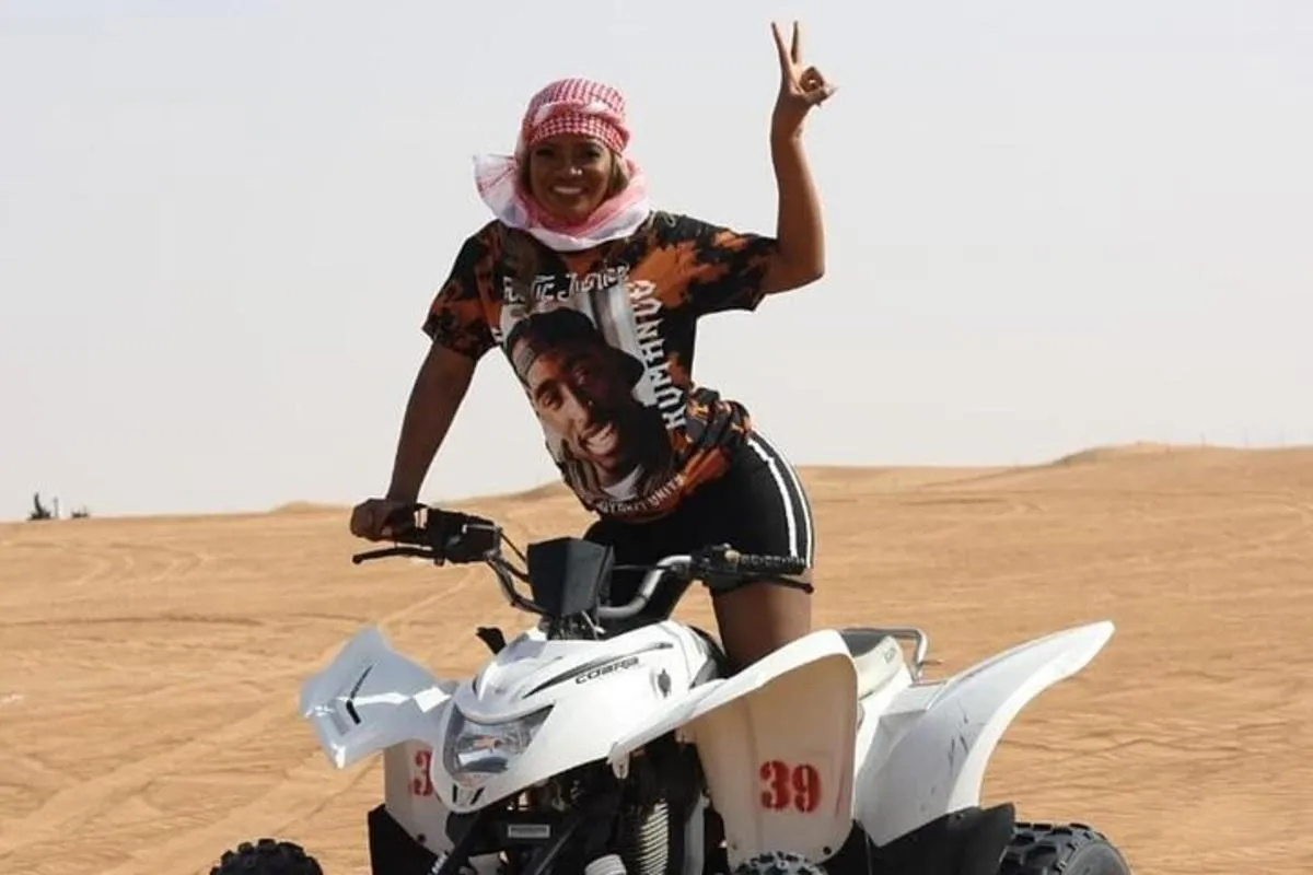 Image 1 of Dubai Desert Safari with Quad Bike, Camel Ride, Sandboard and BBQ