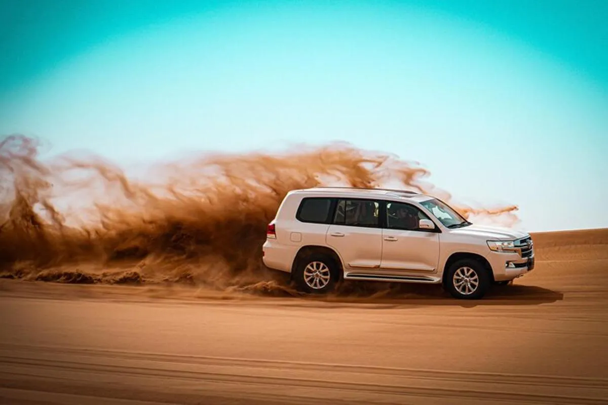 Image 1 of Dubai Desert Sunrise with Dune Bashing & Camel Ride