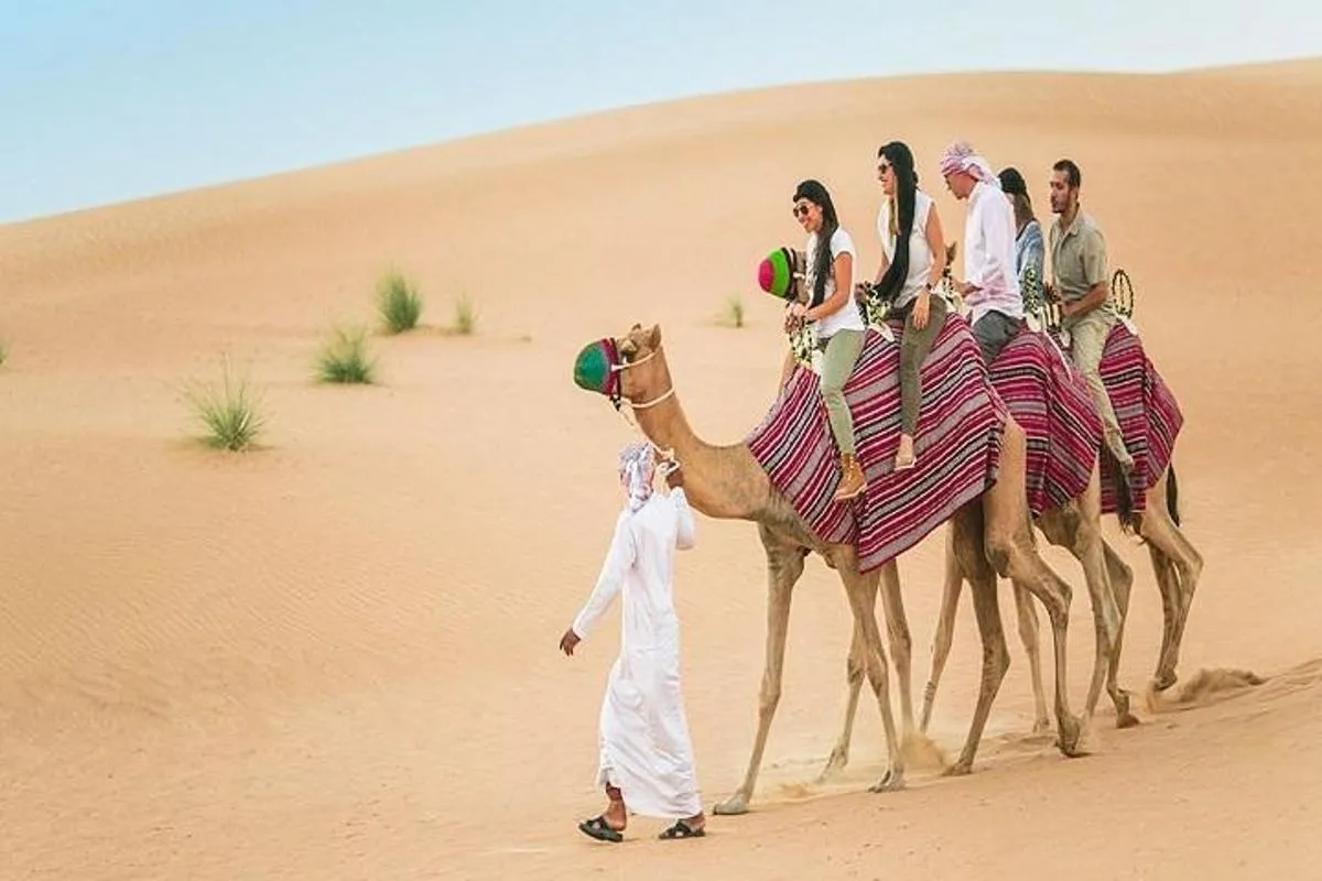 Image 2 of Dubai Morning Desert Quad Bike Tour with Sandboarding & Camel Ride
