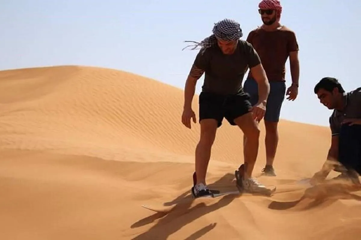Image 2 of Dubai Morning Desert Safari: Red Dunes, Sandboarding, Camel Ride at Bedouin
