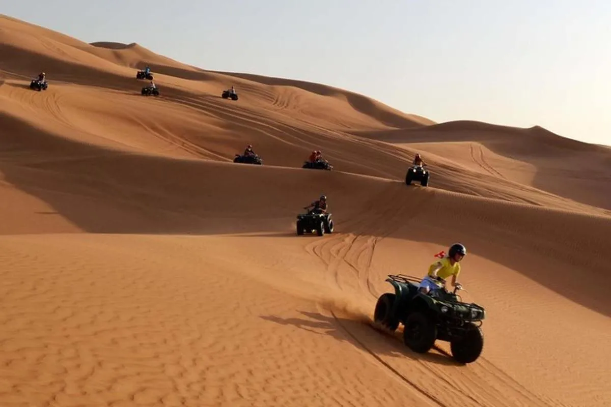 Image 0 of Dubai Morning Quad Bike with Sandboarding and Camel Ride