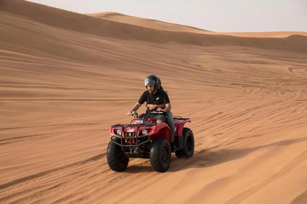 Image 2 of Dubai Morning Quad Bike with Sandboarding and Camel Ride