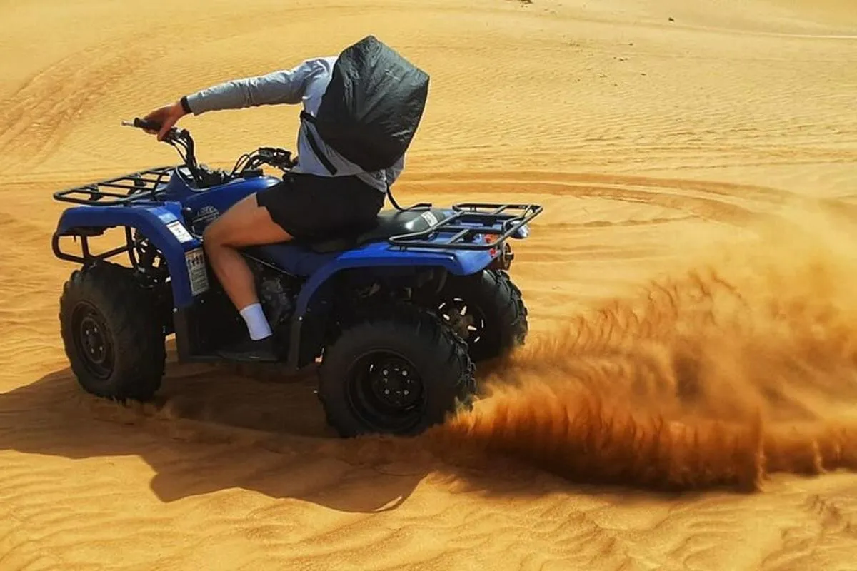 Image 1 of Dubai: Red Dune Quad Bike Desert Safari Adventure