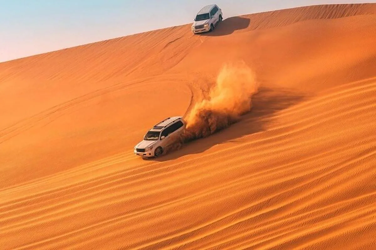 Image 1 of Dubai: Red Dunes Desert Safari, Camel ride, Sandboard, Quad Bike