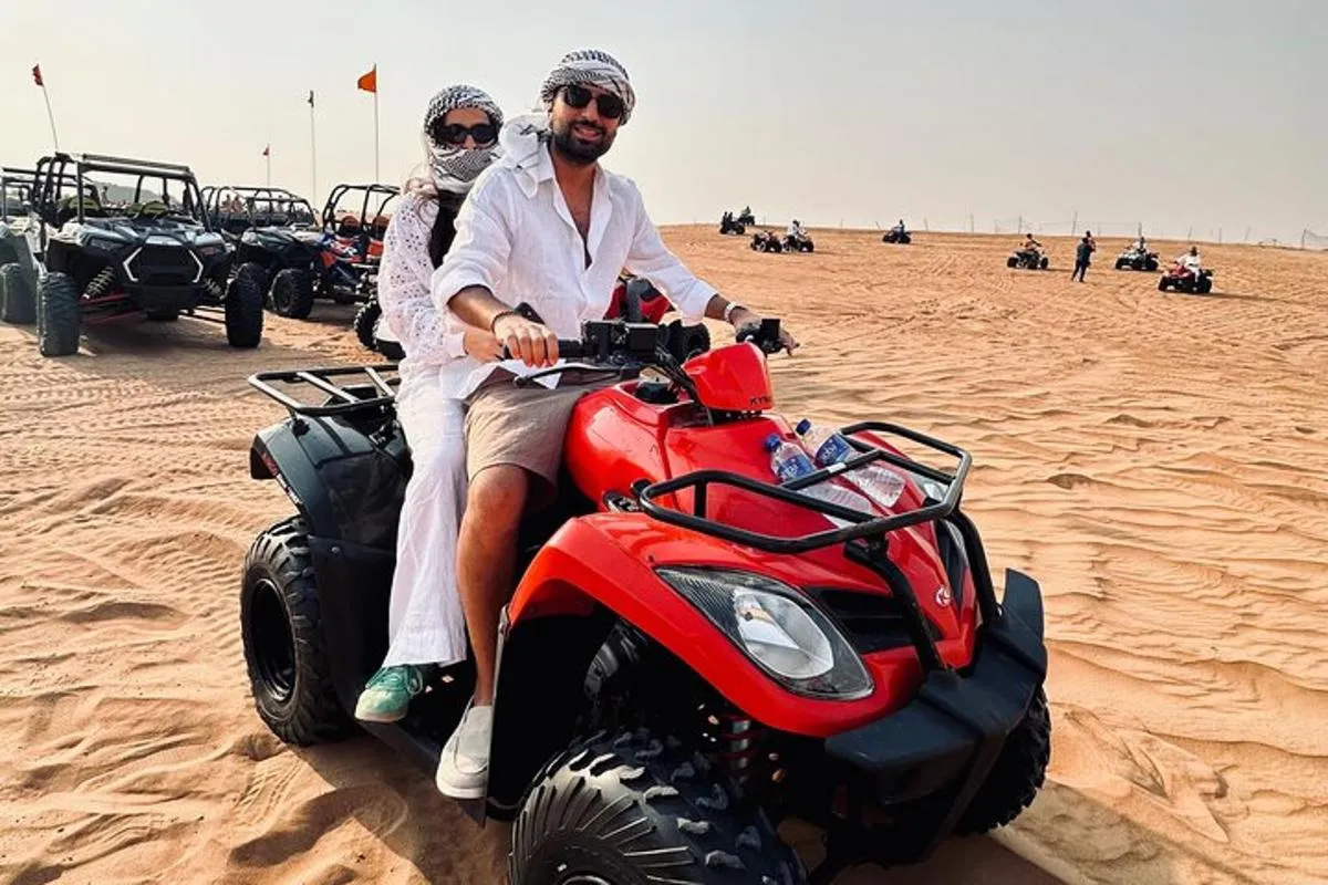 Image 1 of Dubai: Red Dunes, Sandsurf, Camel Ride, BBQ Dinner at Desert Camp