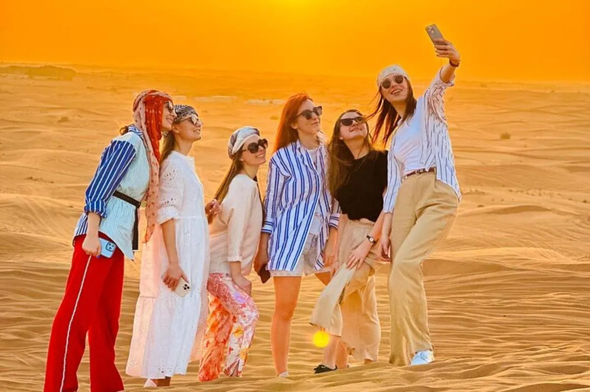 Image 0 of Dubai Sunset Red Dune Desert Safari, Sandboarding and Camel Ride