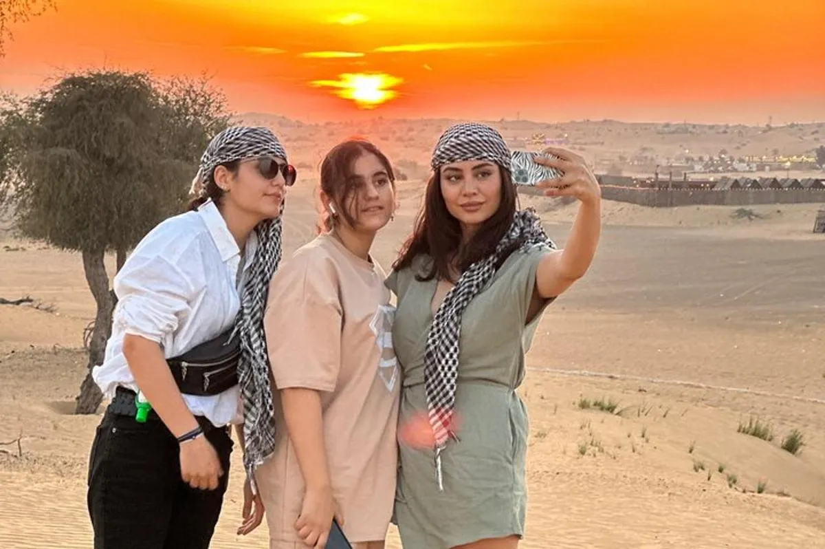 Image 1 of Dubai Sunset Red Dune Desert Safari, Sandboarding and Camel Ride