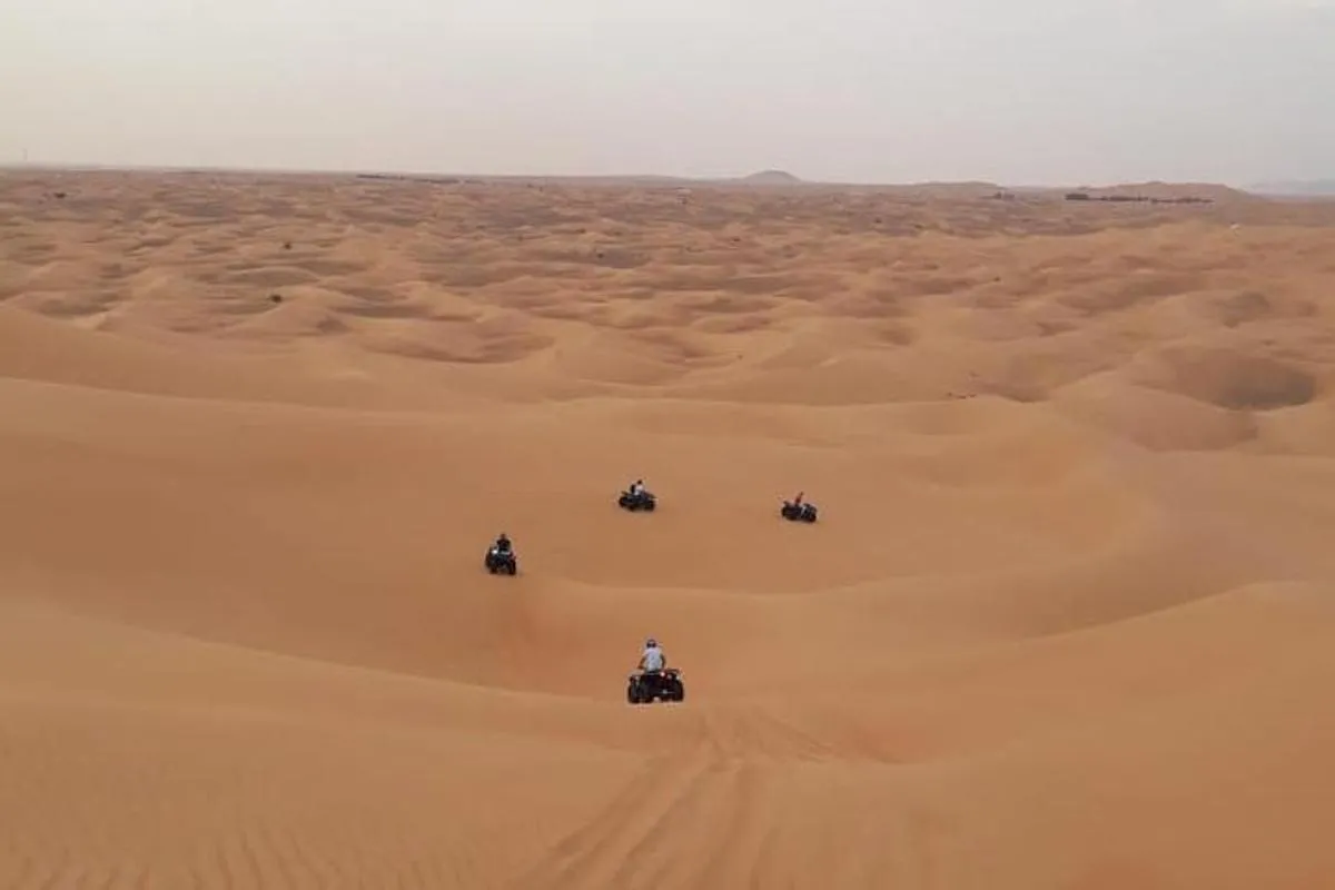 Image 1 of Dubai: Unique MORNING Quad Bike Red Dunes Safari
