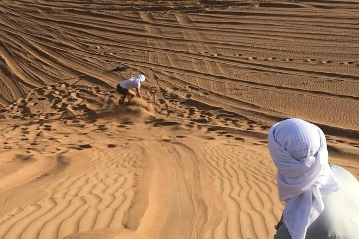 Image 1 of Dubai: Unique SUNSET Quad Bike Red Dunes Safari