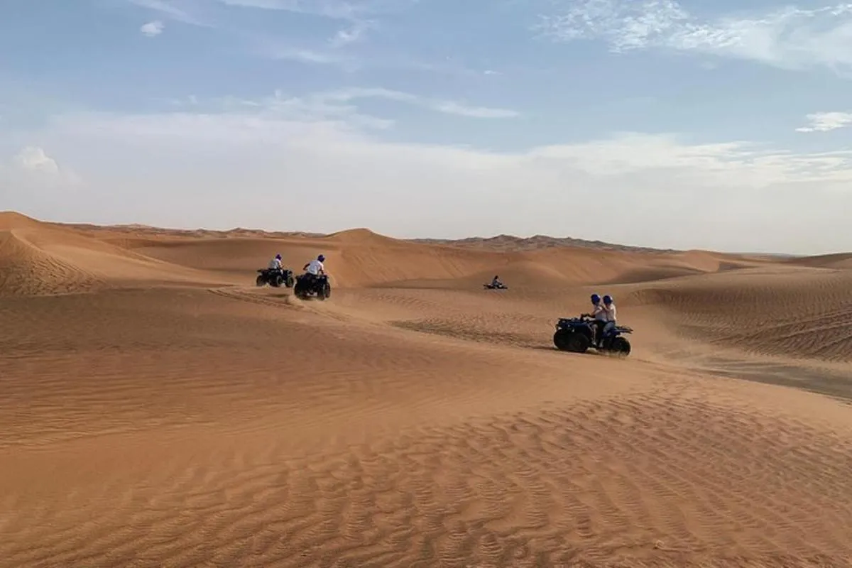 Image 3 of Dubai: Unique SUNSET Quad Bike Red Dunes Safari