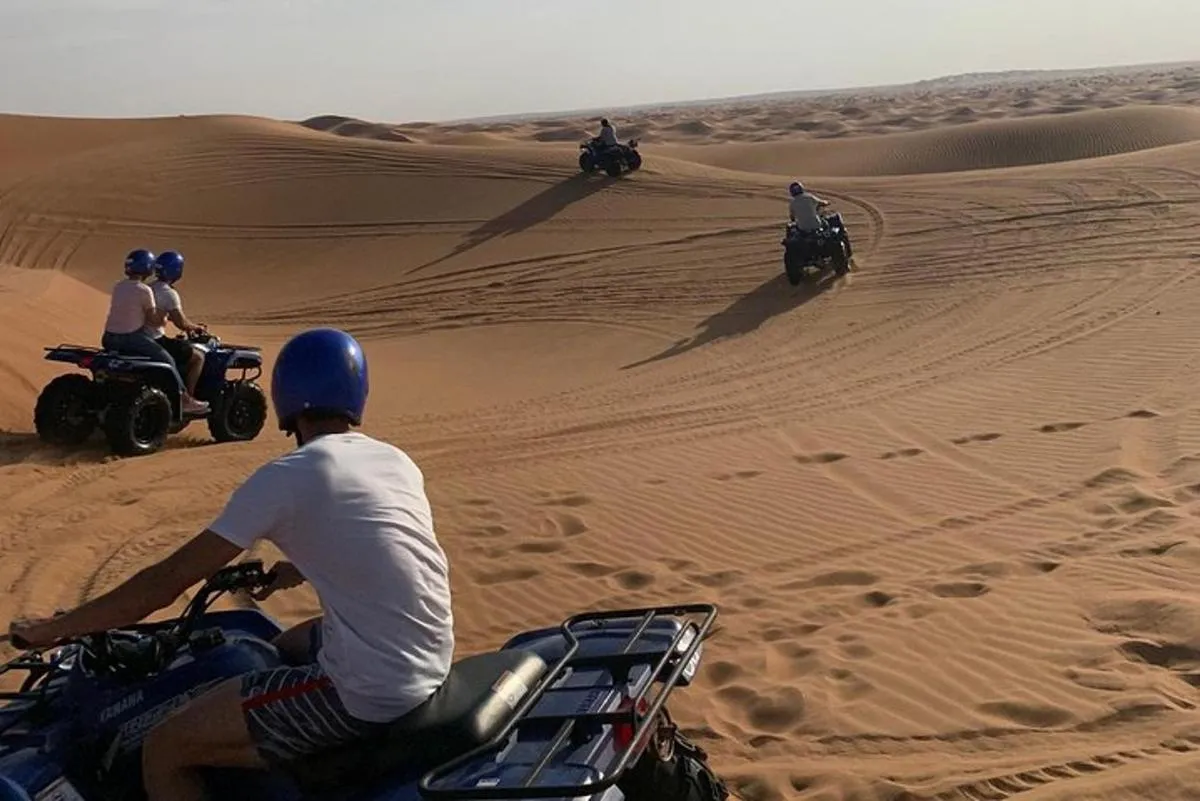 Image 6 of Dubai: Unique SUNSET Quad Bike Red Dunes Safari