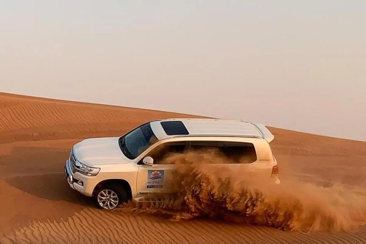 Image 0 of Exciting DXB Morning Desert Safari: Camel Ride & Sandboarding!