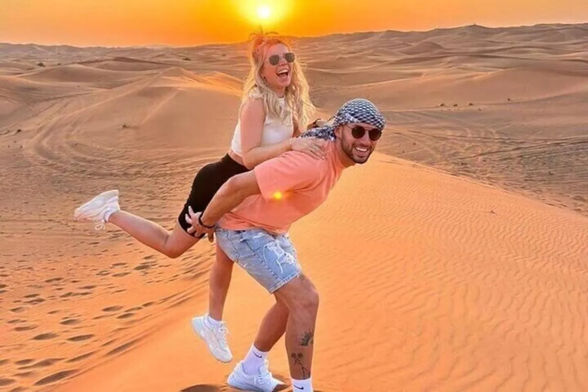 Image 2 of Exclusive Morning Desert Adventure: Sandboarding & Camel Ride