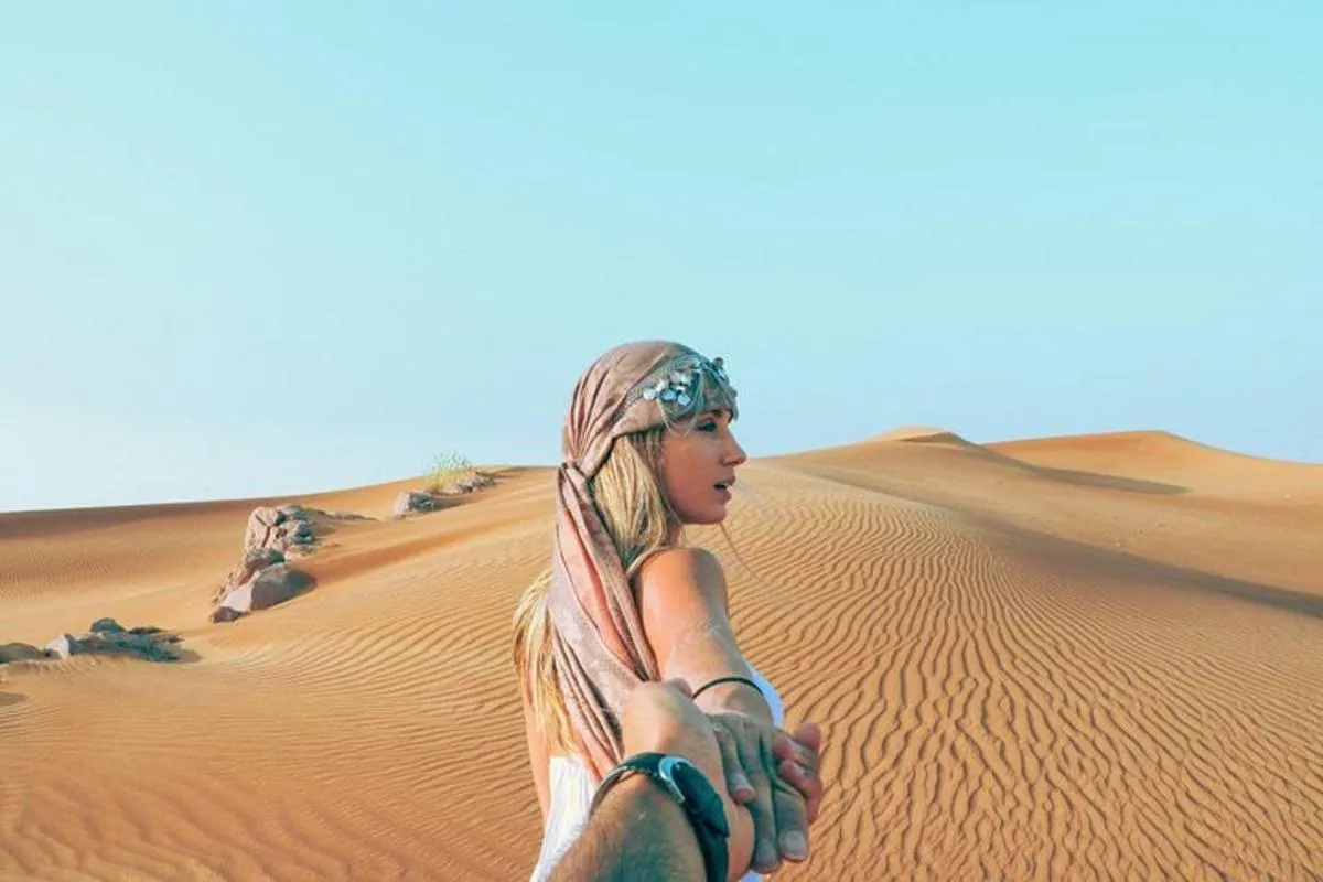 Image 1 of Morning Red Dunes Safari: Camel Ride & Sandboarding Adventure