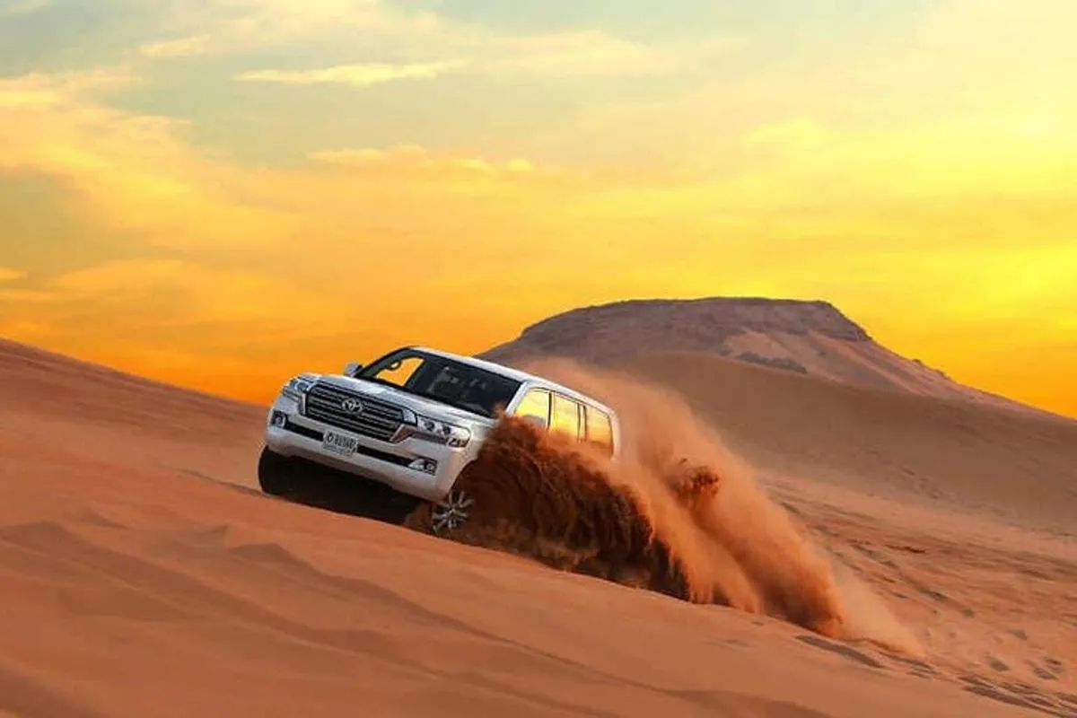 Image 1 of Morning Red Dunes Safari: Quad Biking, Sandboarding & Camel Ride