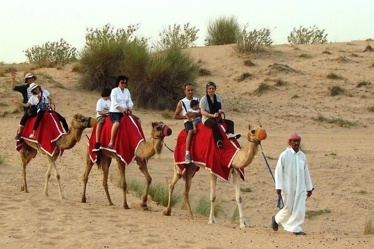 Image 2 of Premium Desert Safari with BBQ Dinner,Belly Dance,Camel Riding & Sand Boarding