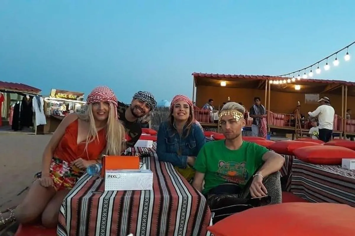 Image 4 of Premium Desert Safari with BBQ Dinner,Belly Dance,Camel Riding & Sand Boarding