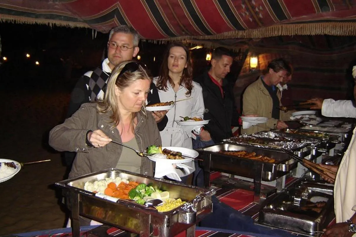 Image 4 of Private Desert Safari With Sand Boarding Quad bike and Camel Ride BBQ Dinner