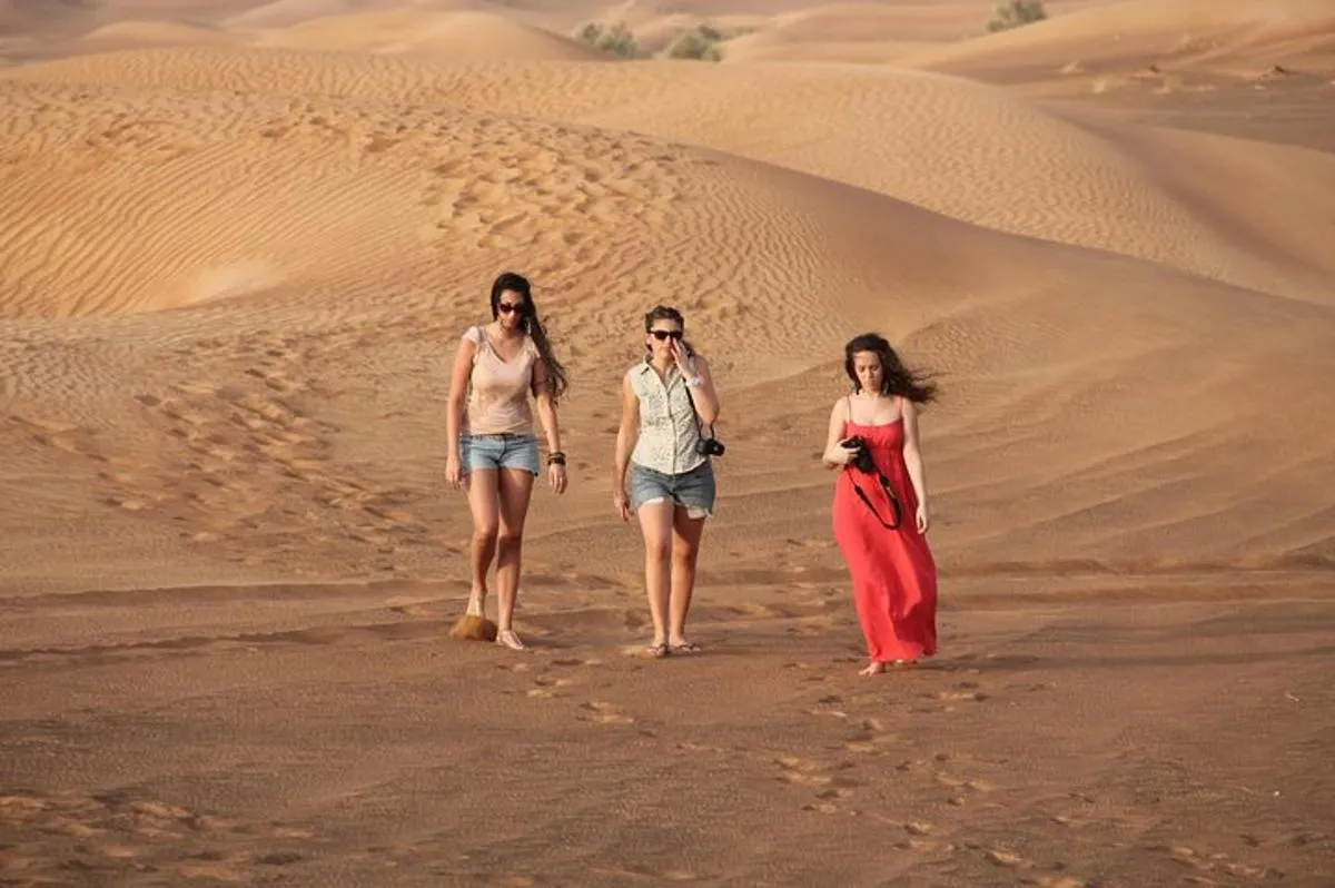 Image 1 of Red Dunes Adventure: Sandboarding, Camel Ride,BBQ & Entertainment
