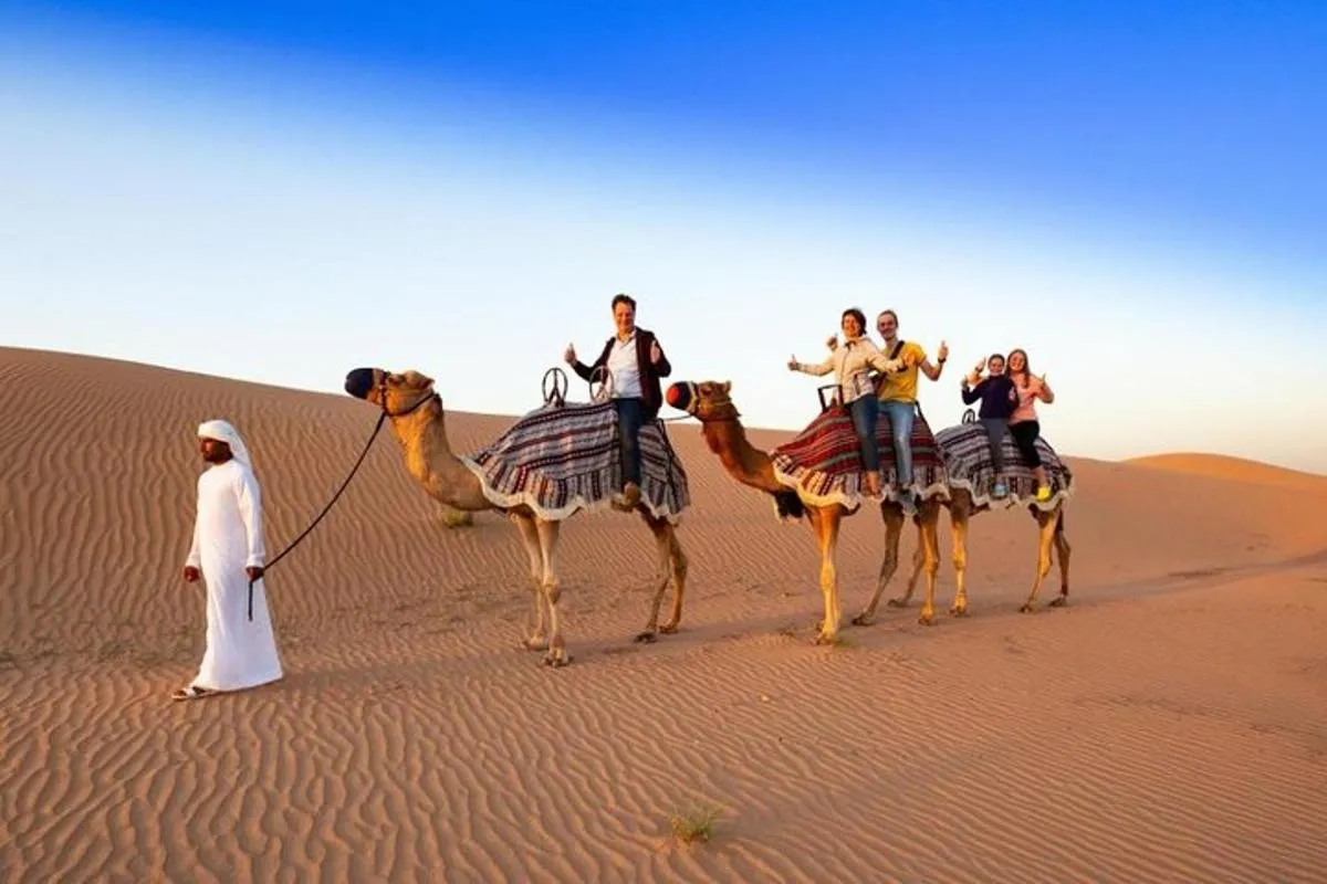 Image 1 of Red Dunes Desert Safari with 4×4 Pick up & Drop, Camel ride, BBQ and Live shows