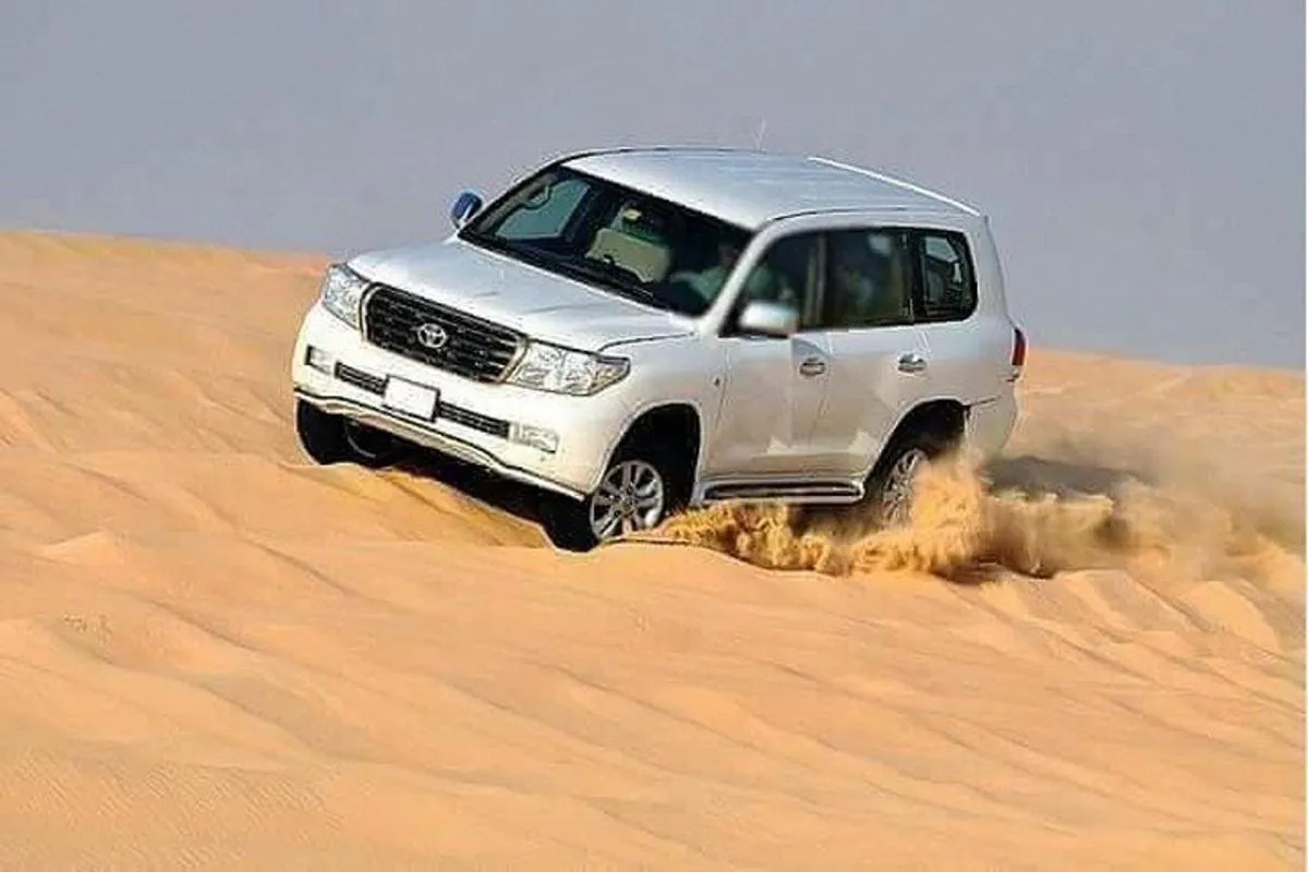 Image 2 of Sunset Desert Safari with BBQ, Camel Ride & Sandboarding