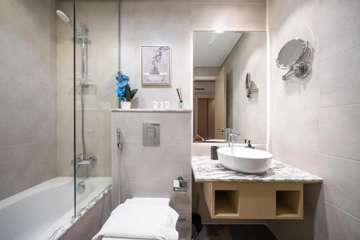 64th floor rooftop pool offering amazing Burj Khalifa views, 2BR apartment in Paramount Hotel Midtown - 2