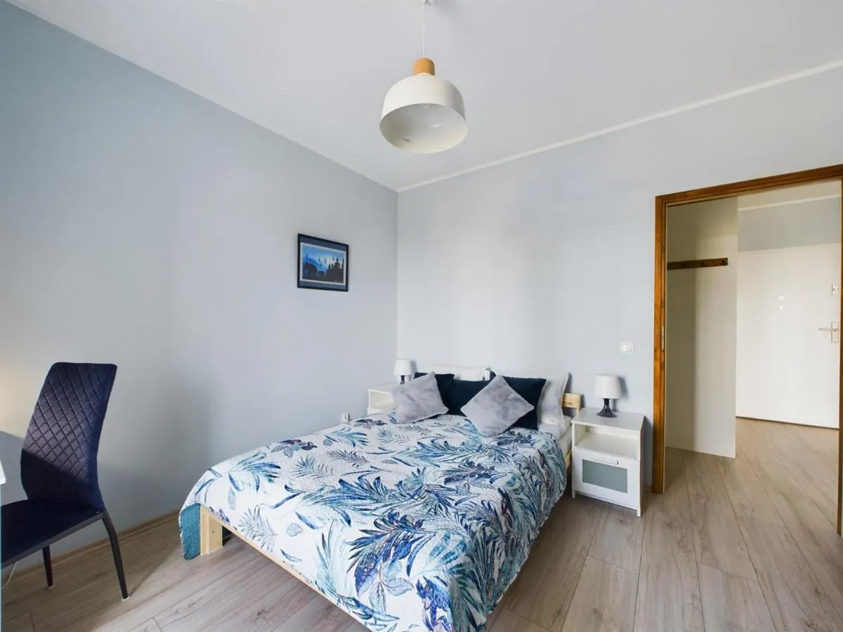 Image 1 of Bright & Modern Braminskiego Apartment with Parking and Balcony by Renters
