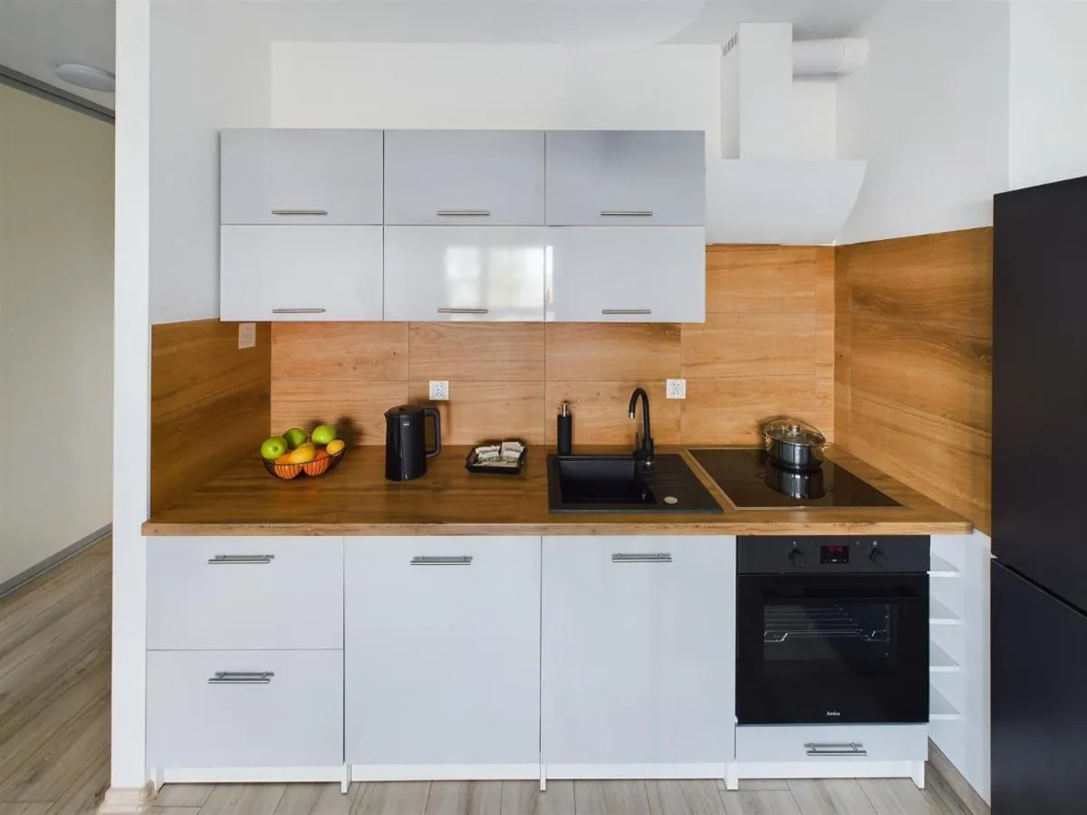 Image 2 of Bright & Modern Braminskiego Apartment with Parking and Balcony by Renters