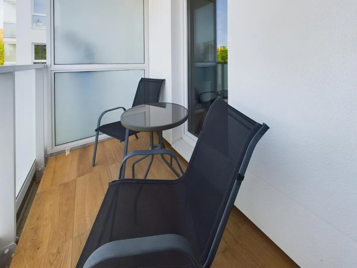 Image 6 of Bright & Modern Braminskiego Apartment with Parking and Balcony by Renters