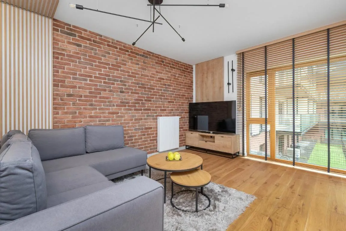 Image of Elegant Apartment in Gdańsk with Sauna, Gym and Parking by Renters